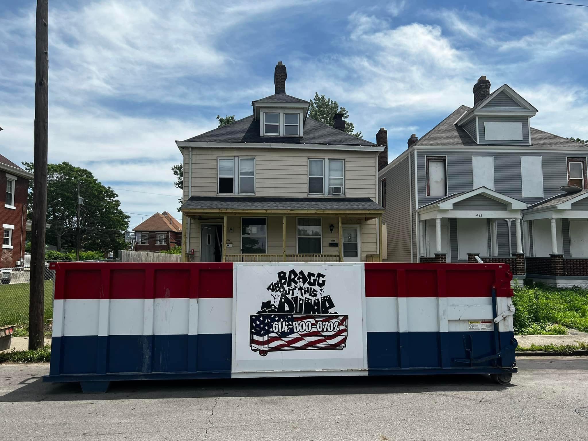 bragg-dumpster-in-front-of-house